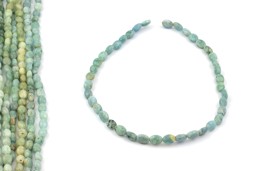 Vedere dettagli per Acquamarina sfaccettata. Filo ovale 7x10 mm Immagine di Acquamarina sfaccettata. Filo ovale 7x10 mm