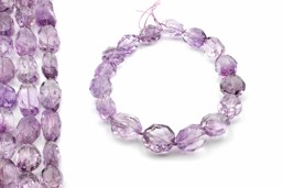 Vedere dettagli per Ametista sfaccettata. Filo da 25-40 mm Immagine di Ametista sfaccettata. Filo da 25-40 mm