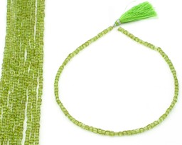 Vedere dettagli per Cubi sfaccettati di Peridoto da 4 mm a filo Immagine di Cubi sfaccettati di Peridoto da 4 mm a filo