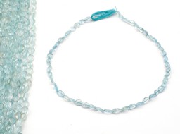 Vedere dettagli per Acquamarina sfaccettata. Filo di gocce (tutte le dimensioni) Immagine di Acquamarina sfaccettata. Filo di gocce (tutte le dimensioni)