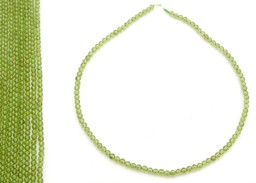 Vedere dettagli per Perline tonde da 4 mm di Peridoto Immagine di Perline tonde da 4 mm di Peridoto