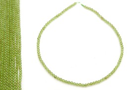 Bild von Peridot Kugeln  4mm Strang