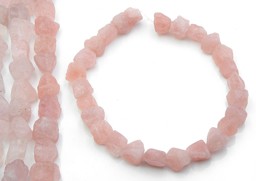 Vedere dettagli per Filo di pezzi grezzi di Quarzo rosa Immagine di Filo di pezzi grezzi di Quarzo rosa