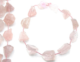 Vedere dettagli per Quarzo rosa nugget 25x35mm filo Immagine di Quarzo rosa nugget 25x35mm filo