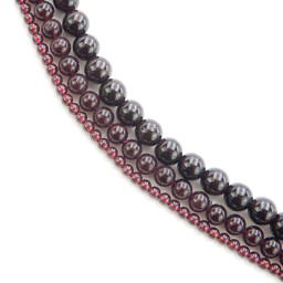 Vedere dettagli per Filo di perline tonde rosso granato standard Immagine di Filo di perline tonde rosso granato standard