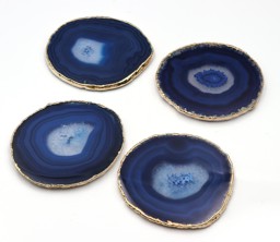 Vedere dettagli per Sottobicchieri a disco in Agata, set di 4 pezzi. Immagine di Sottobicchieri a disco in Agata, set di 4 pezzi.