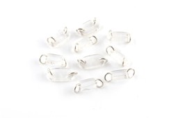 Vedere dettagli per Interruttore energetico in cristallo di rocca. Dischi ovali 16x8 mm con 2 fori e anelli.  Immagine di Interruttore energetico in cristallo di rocca. Dischi ovali 16x8 mm con 2 fori e anelli.