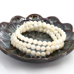 Vedere dettagli per Madreperla sfaccettata. Bracciale di perline tonde da 6 mm Immagine di Madreperla sfaccettata. Bracciale di perline tonde da 6 mm