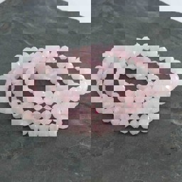 Vedere dettagli per Quarzo rosa sfaccettato. Bracciale rondelle 8 mm Immagine di Quarzo rosa sfaccettato. Bracciale rondelle 8 mm