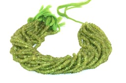 Vedere dettagli per Peridoto sfaccettato. Rondelle di 4 mm. Immagine di Peridoto sfaccettato. Rondelle di 4 mm.