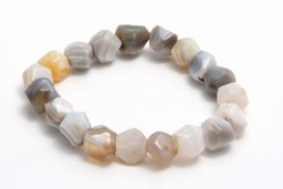 Vedere dettagli per Agata sfaccettata. Bracciale di nuggets Immagine di Agata sfaccettata. Bracciale di nuggets
