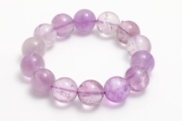 Vedere dettagli per Perline tonde di ametista 14 mm bracciale chiaro Immagine di Perline tonde di ametista 14 mm bracciale chiaro
