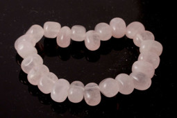 Vedere dettagli per Bracciale in quarzo rosa (foro in alto) 8-12 mm circa Immagine di Bracciale in quarzo rosa (foro in alto) 8-12 mm circa
