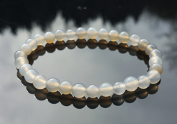 Vedere dettagli per Perline tonde da 6 mm per bracciale grigio Immagine di Perline tonde da 6 mm per bracciale grigio