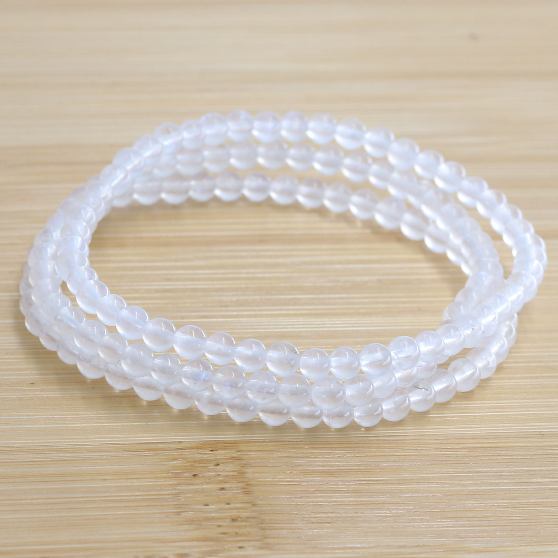 Bild von Mondstein Kugeln 4mm Armband (weiss)