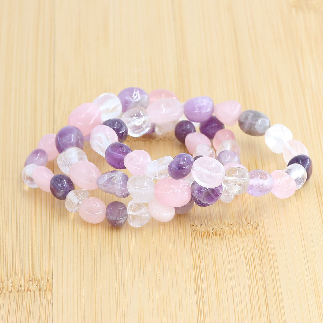 Bild von Amethyst, Bergkristall & Rosenquarz Nuggets Crazy  8-12mm Armband