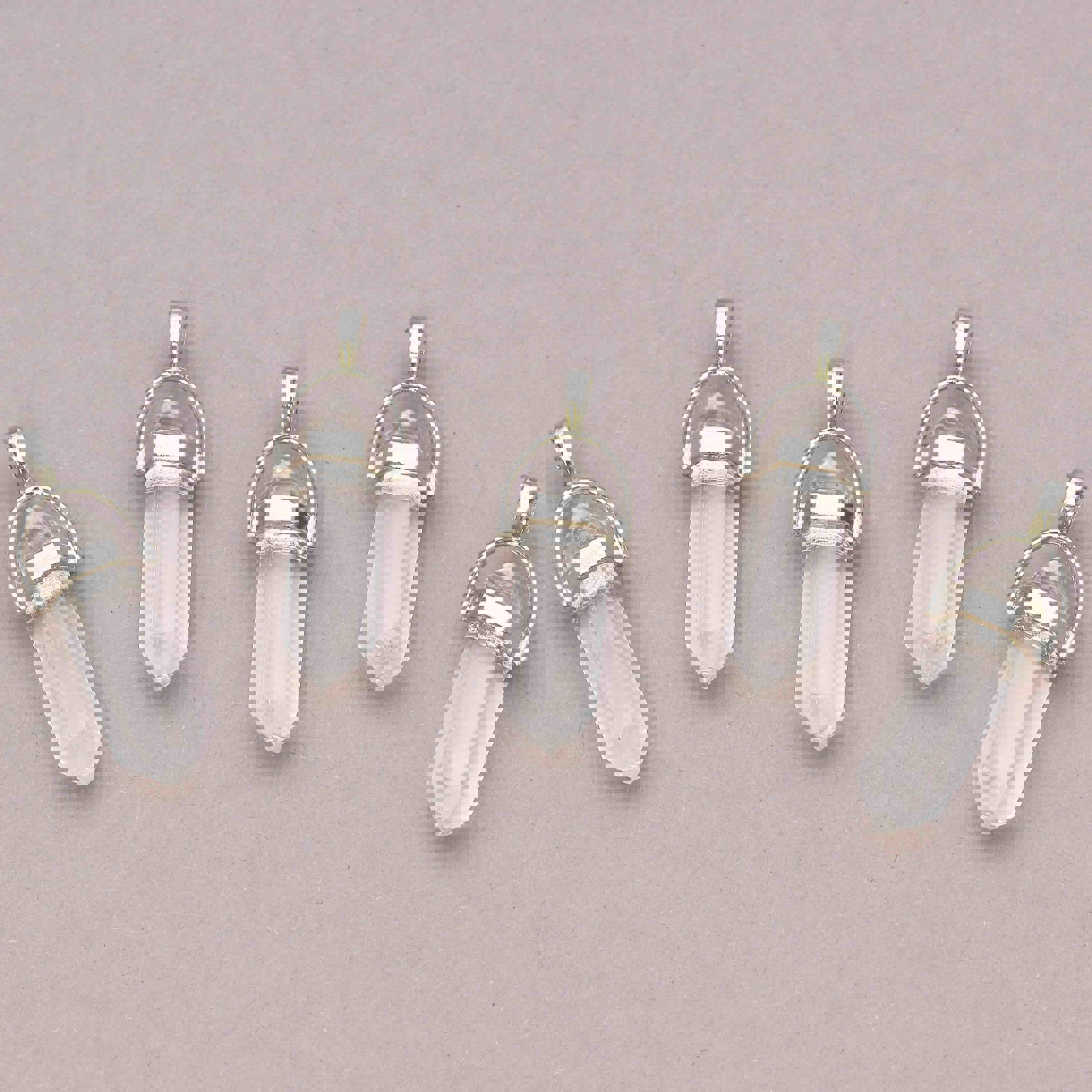 Image de Cristal de roche Pointe bi terminée 30x10mm Pendentif avec oeillet métallique
